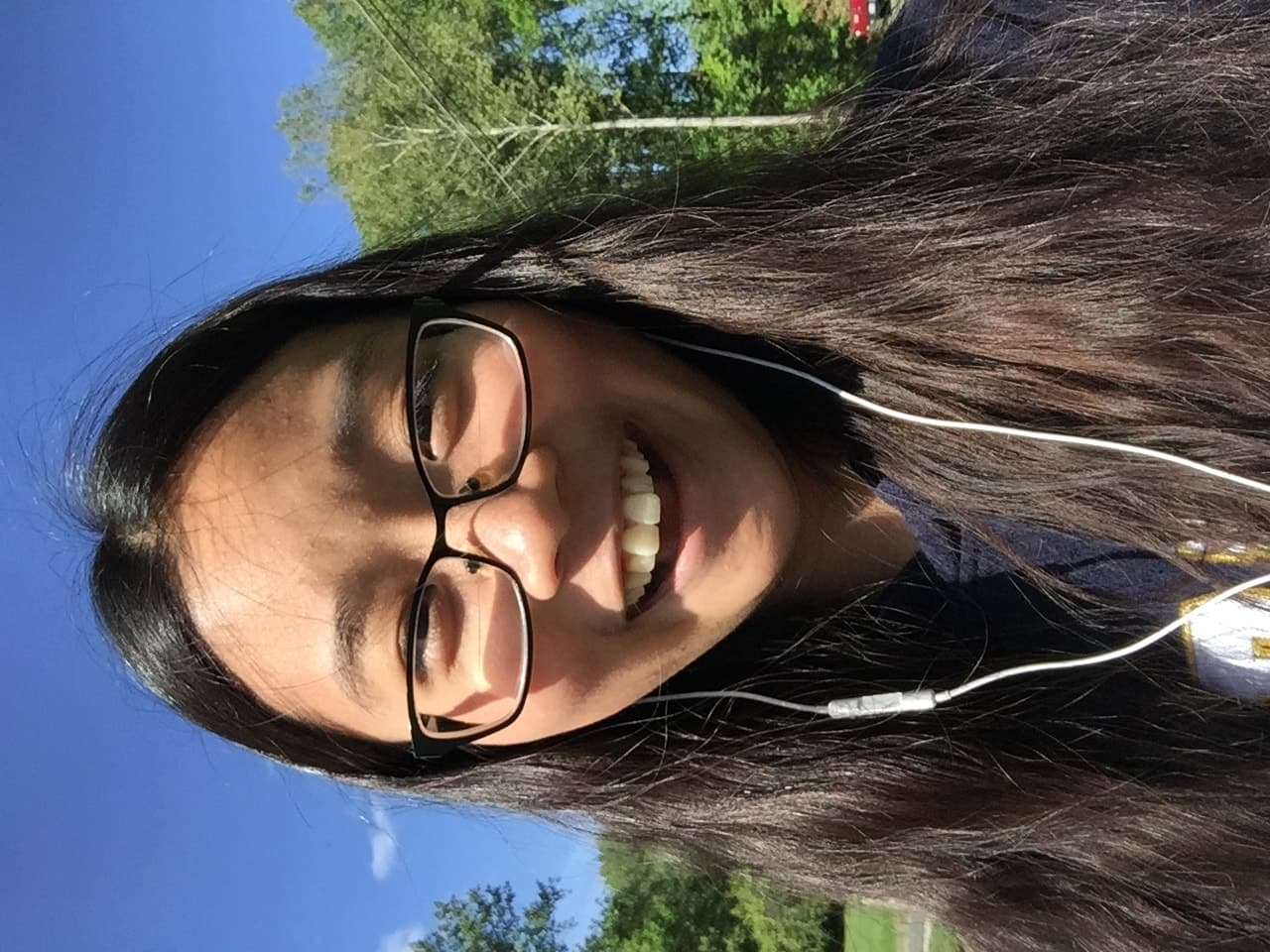 walking in neighborhood wearing blue